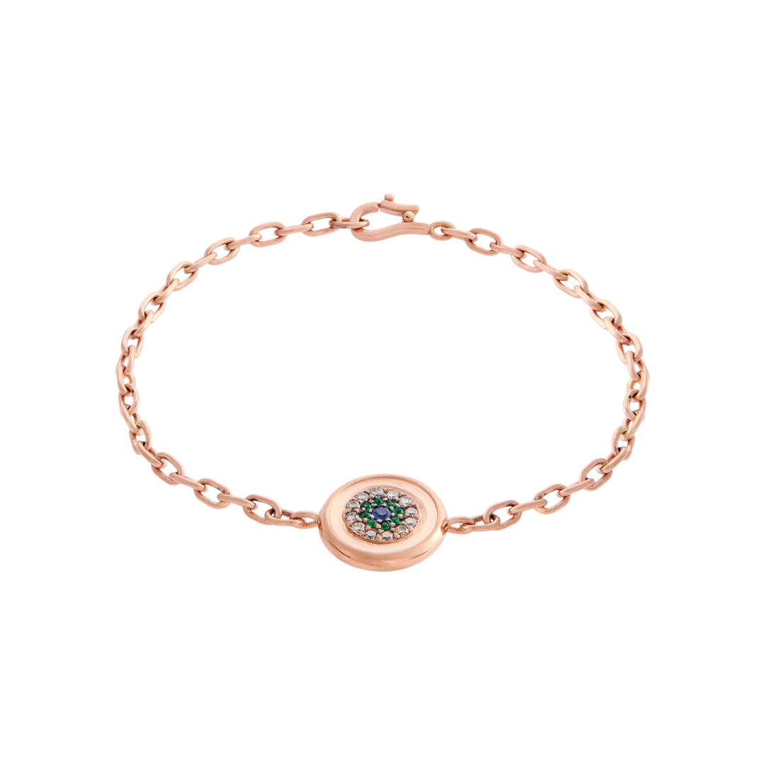Ileana Makri 14k rose gold chain bracelet featuring a reversible round eye motif with emeralds and champagne diamonds.