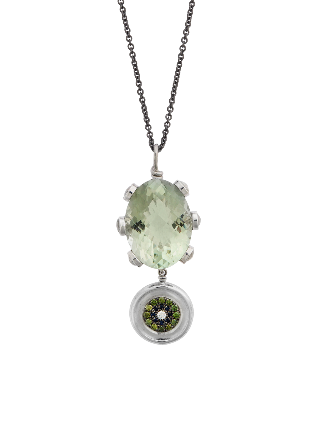 Ileana Makri double eye pendant featuring a green amethyst, green diamonds, and sapphires on a dark steel chain.