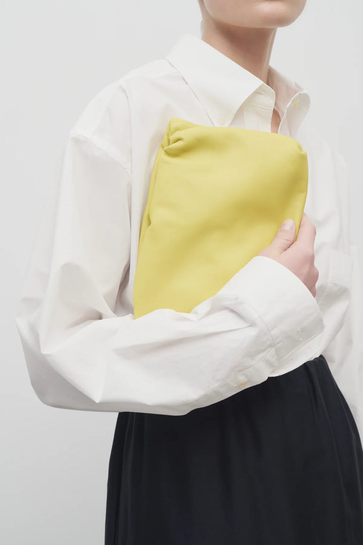Bourse Clutch in Coppery Yellow