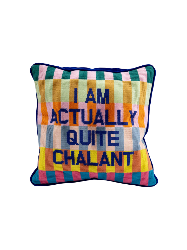 Ileana Makri Chalant needlepoint pillow with a colorful checkered pattern and blue embroidered text on velvet back