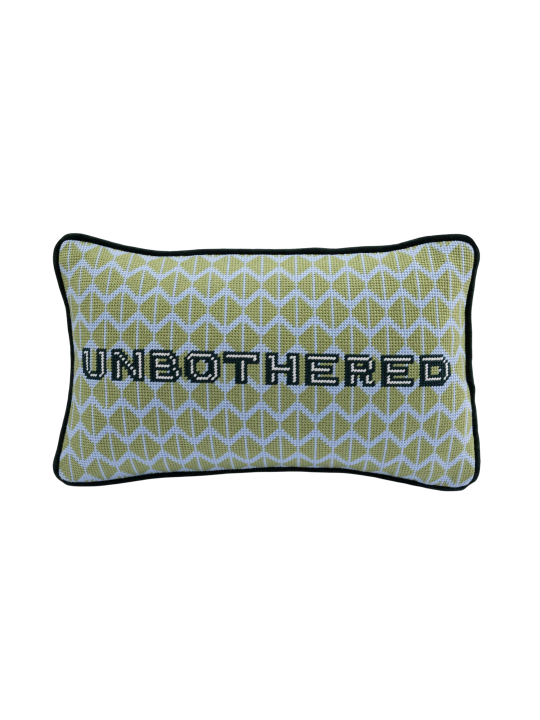 Ileana Makri Unbothered needlepoint pillow featuring a green geometric pattern and black embroidered text.