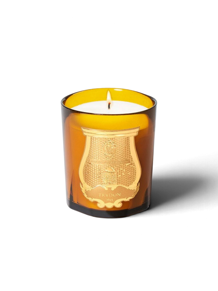 Ileana Makri Cire Trudon Altair scented candle in an amber glass vessel with a gold embossed logo label