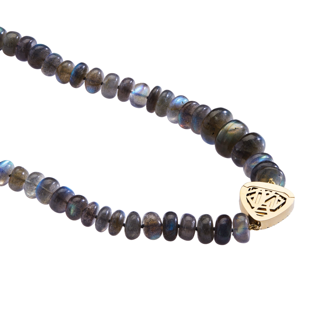Ileana Makri labradorite bead necklace with a sculptural 18k yellow gold clasp featuring intricate geometric detail.
