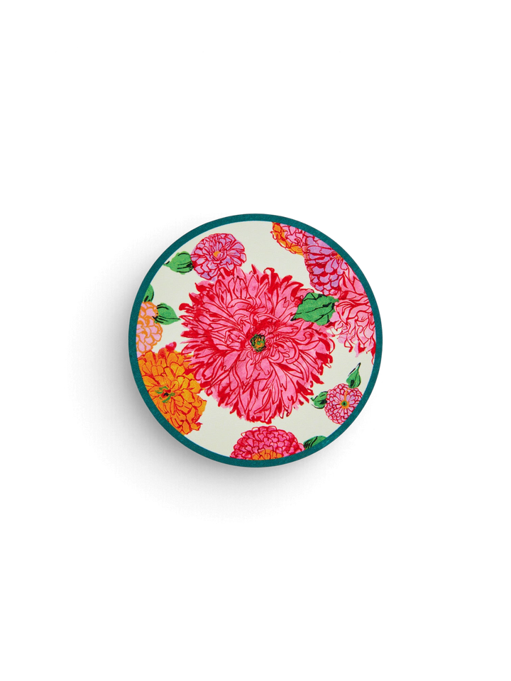 Ileana Makri Bright Blooms circular coaster featuring a vibrant pink and orange floral motif on a white background.