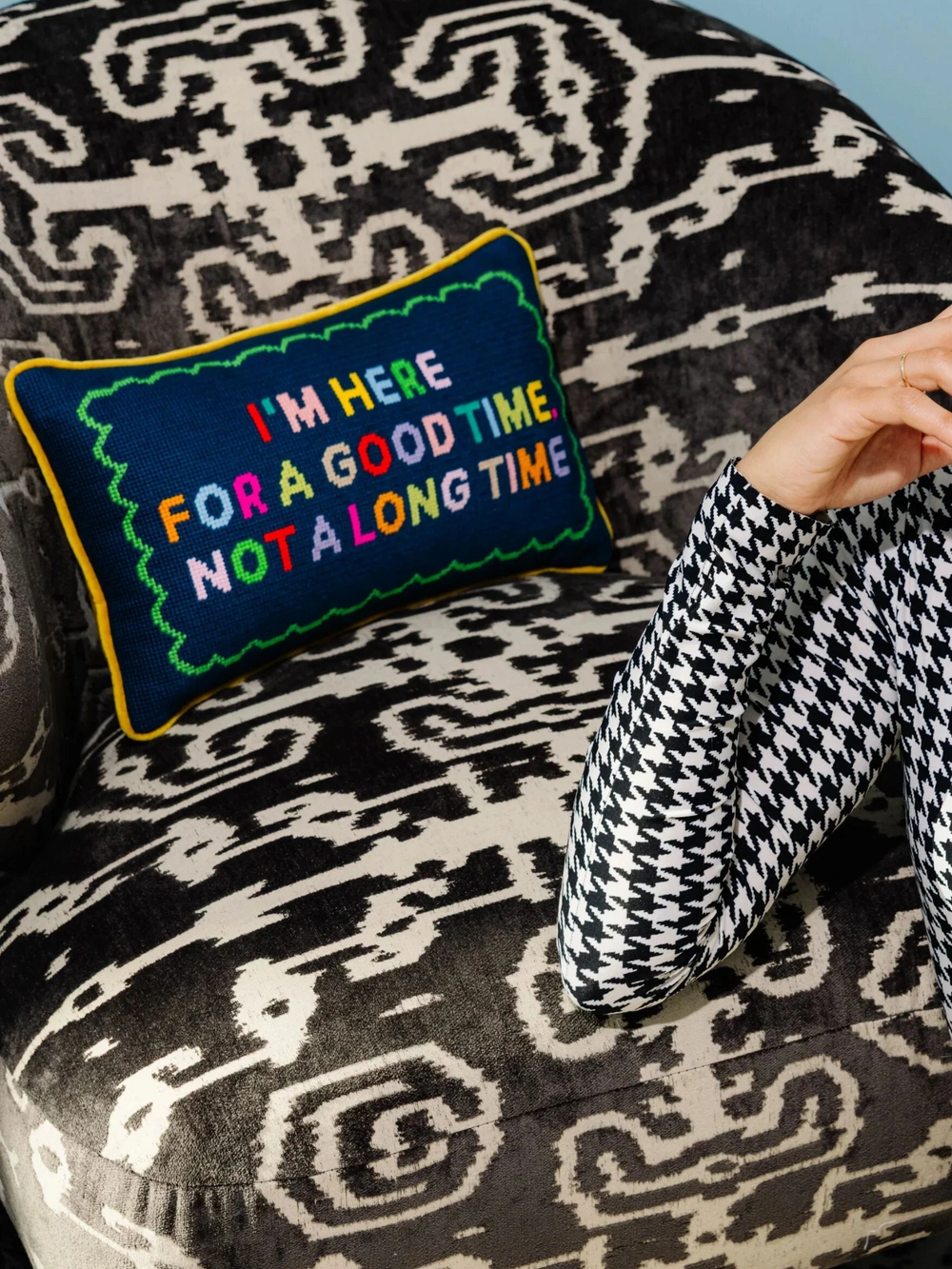 Ileana Makri Good Time needlepoint pillow with colorful embroidered text on a dark blue background and velvet back.