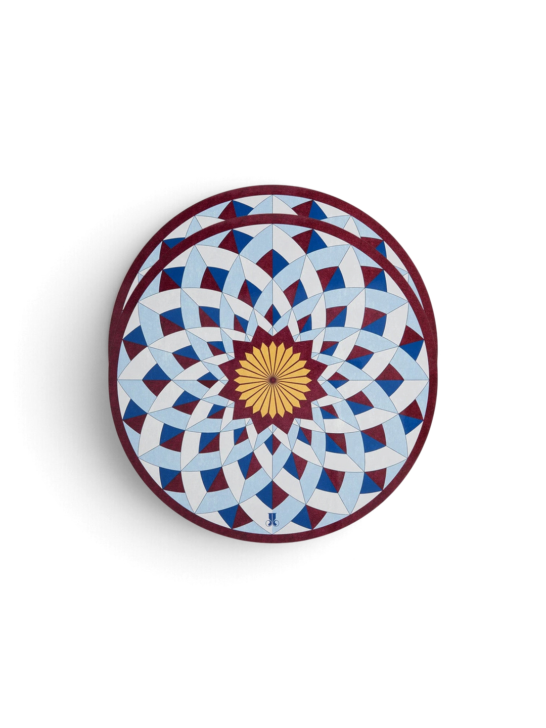 Ileana Makri Lotus of Life circular placemats featuring a blue and geometric mosaic pattern with a cork backing.