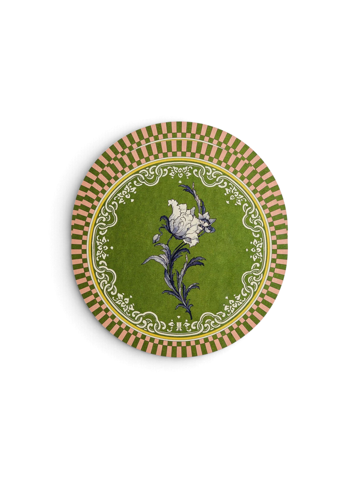 Ileana Makri Nymph Bloom circular placemat in Fiesole green with a white floral motif and decorative striped border.