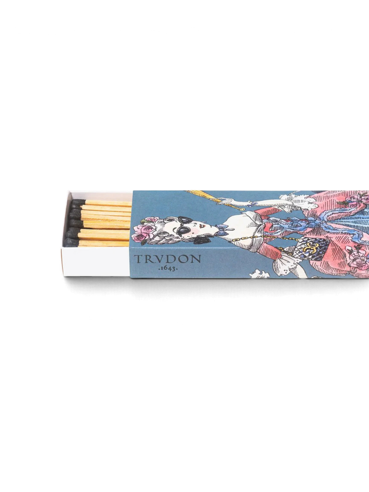 Ileana Makri Trudon scented matches in a blue illustrated box featuring an elegant 18th-century style portrait.