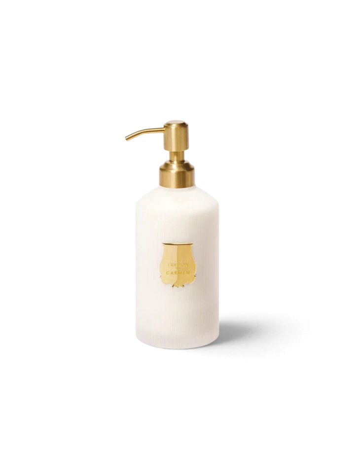 Ileana Makri Carmen scented hand lotion in a 350ml white ribbed glass bottle with a gold pump dispenser