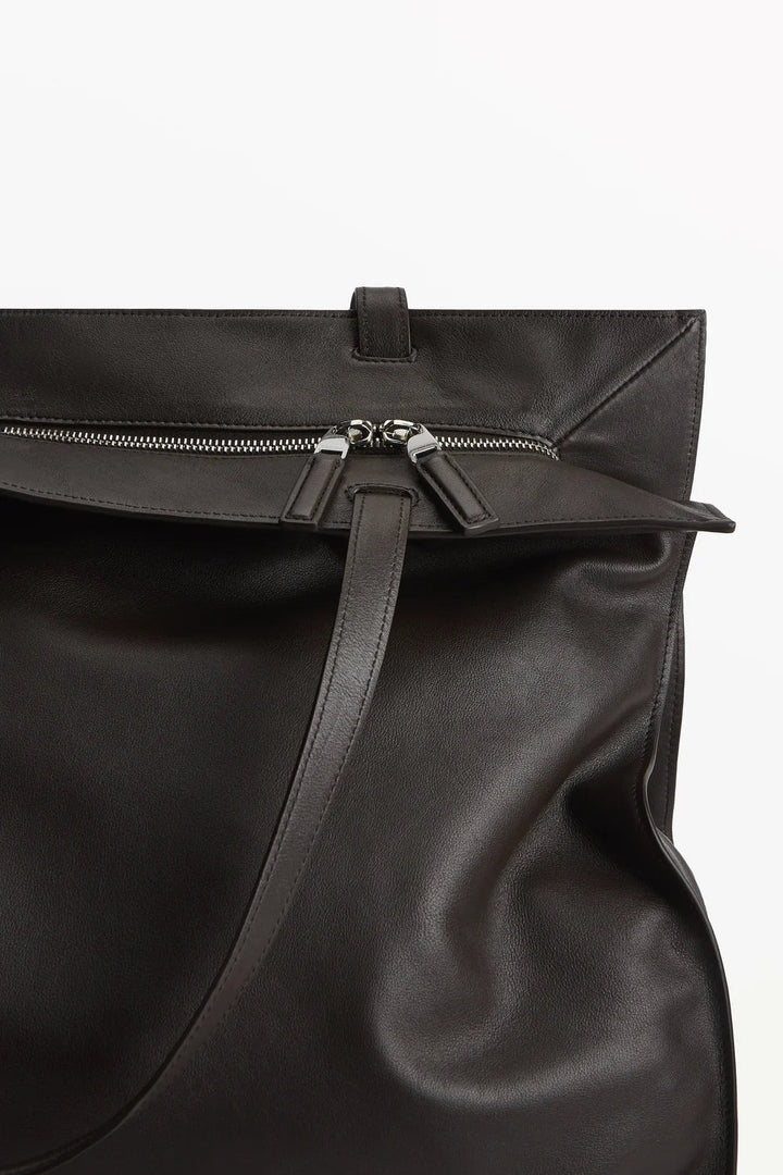 Ileana Makri Yumi Tote in dark brown cacao calfskin leather featuring a two-way zip closure and silver hardware.