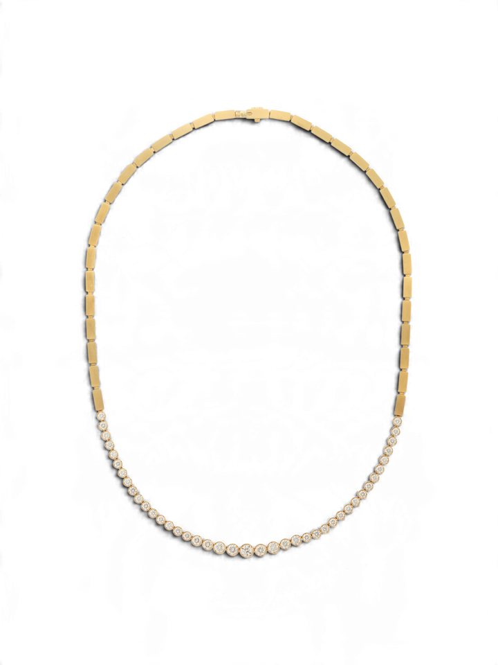 Ileana Makri Diamond River Necklace in 18k yellow gold with a matte finish and bezel-set white diamonds.