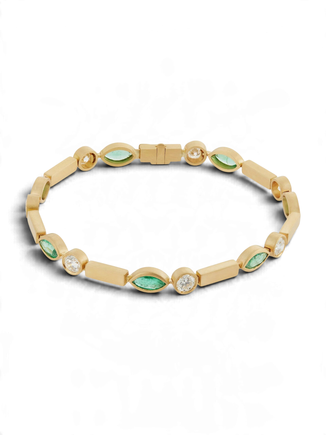 Ileana Makri 18k yellow gold bracelet with navette emeralds and round diamonds in a satin finish.