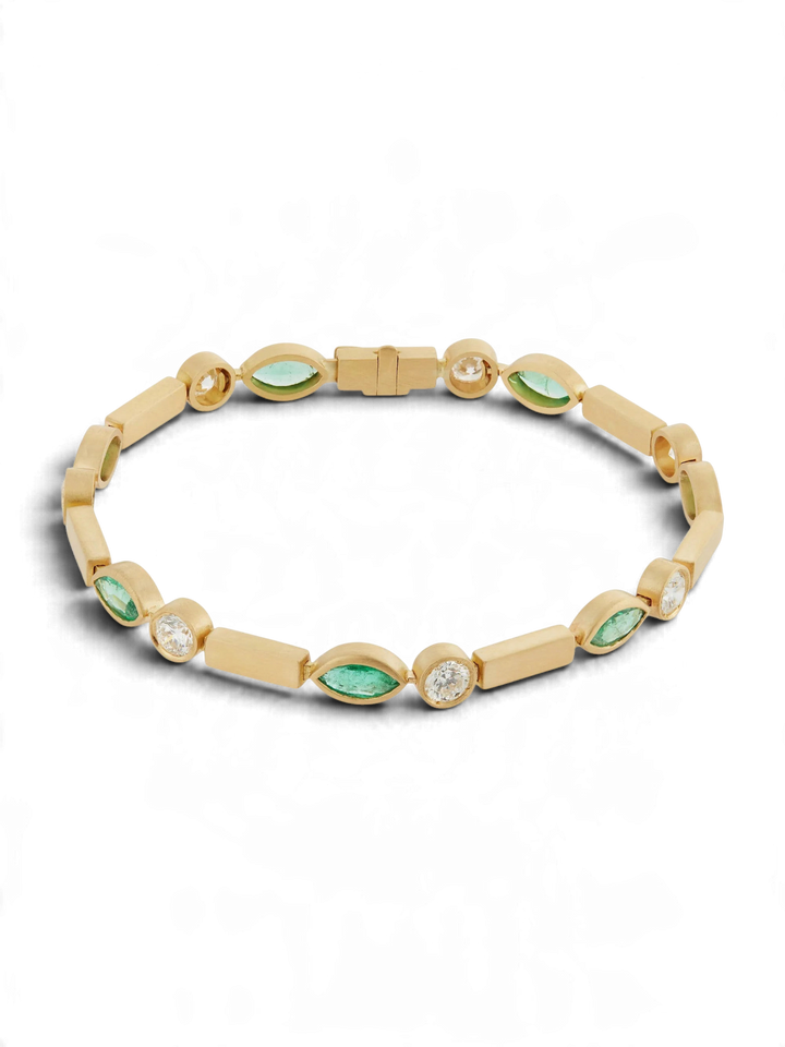 Ileana Makri 18k yellow gold bracelet with navette emeralds and round diamonds in a satin finish.
