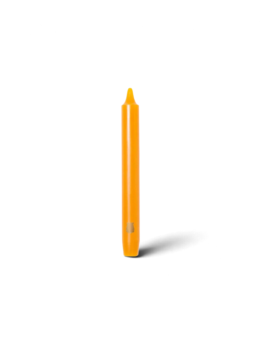 Ileana Makri Mimosa Madeleine tapered candle in vibrant orange wax with a smooth finish and embossed logo detail.