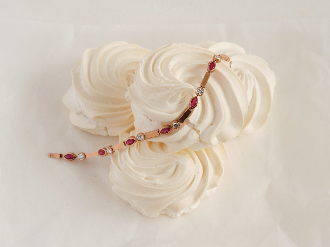 Ileana Makri Ruby Navette Stream Bracelet in 18k rose gold with marquise rubies and diamonds on white meringue