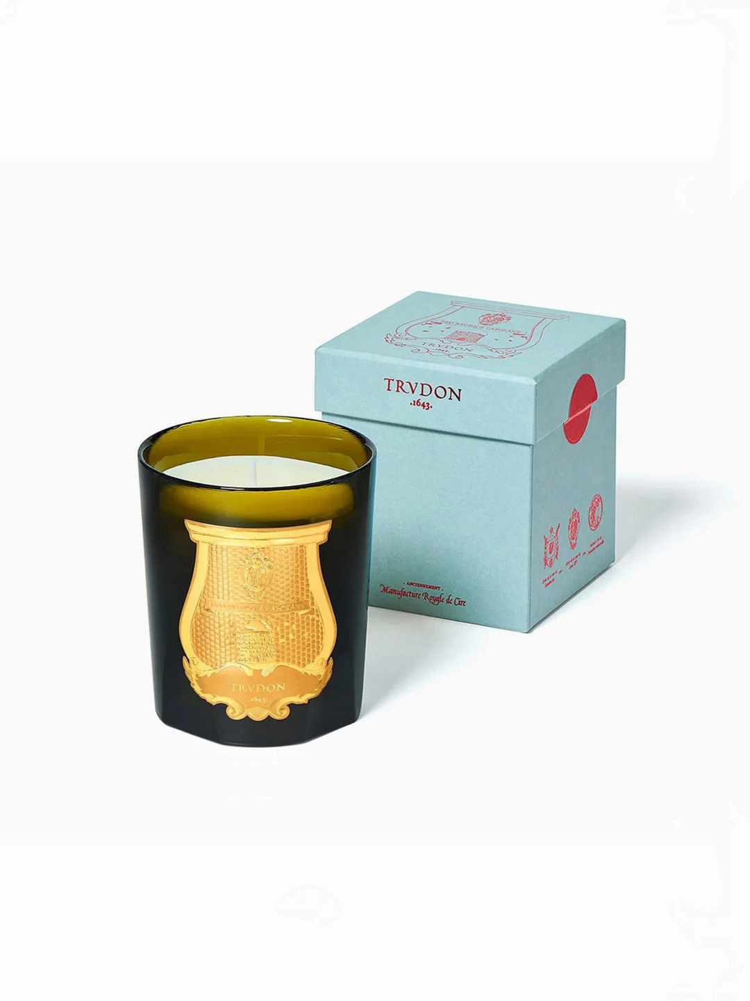 Ileana Makri Gabriel Gourmand Chimney Fire scented candle in a dark green glass jar with a gold emblem and gift box.