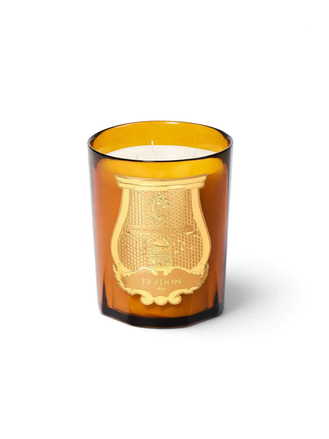 Ileana Makri Cire Trudon Altair 800g scented candle in amber glass with a gold embossed label and woody floral scent