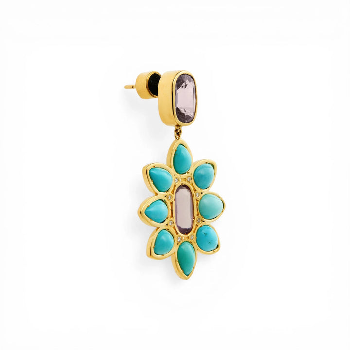 Gold turquoise and purple spinel flower drop earring with gemstone accents on white background